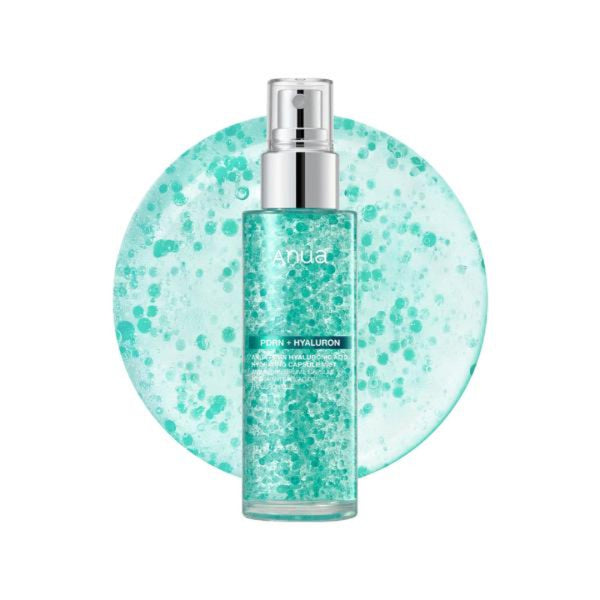 Anda Fresh + Hyaluron facial toner in a clear bottle with a silver pump, set against a circular light teal background filled with bubble-like speckles on a white studio background.